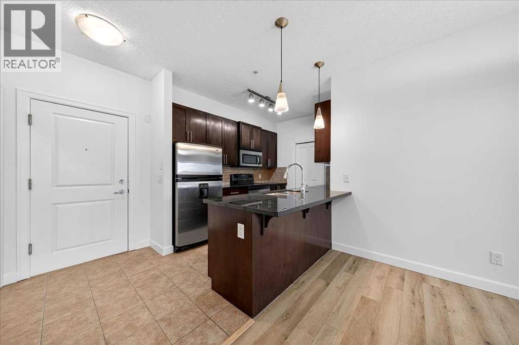 103, 88 Arbour Lake Road NW