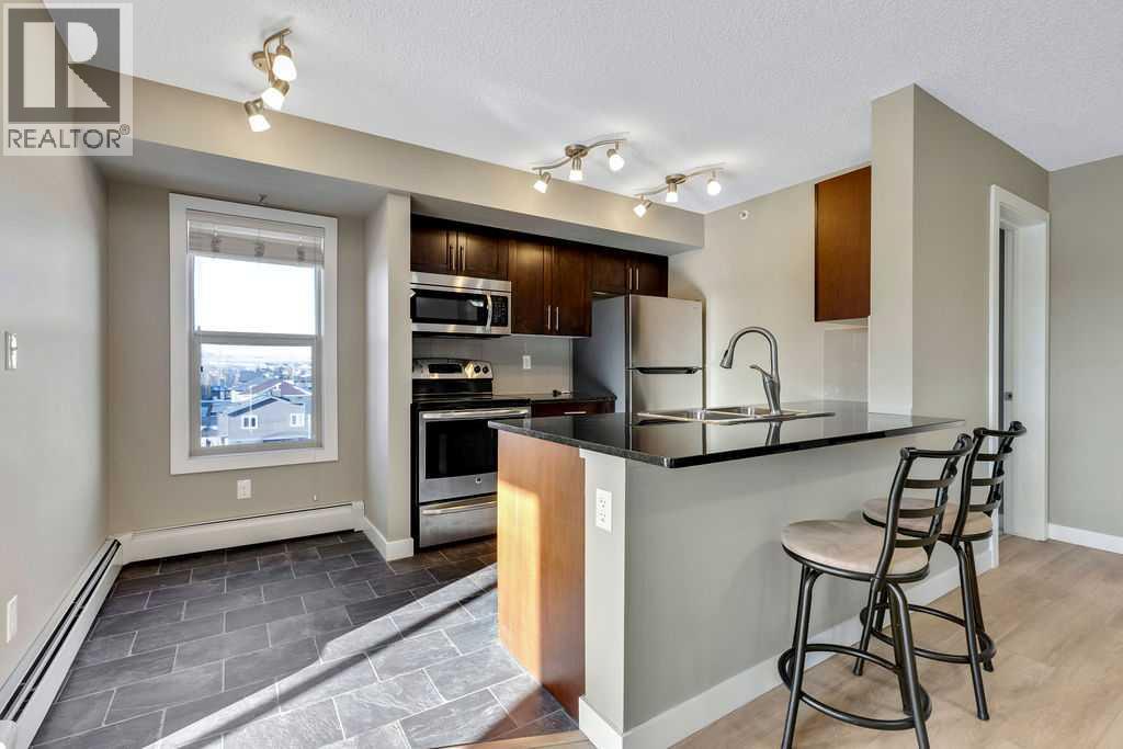 7402, 403 Mackenzie Way SW