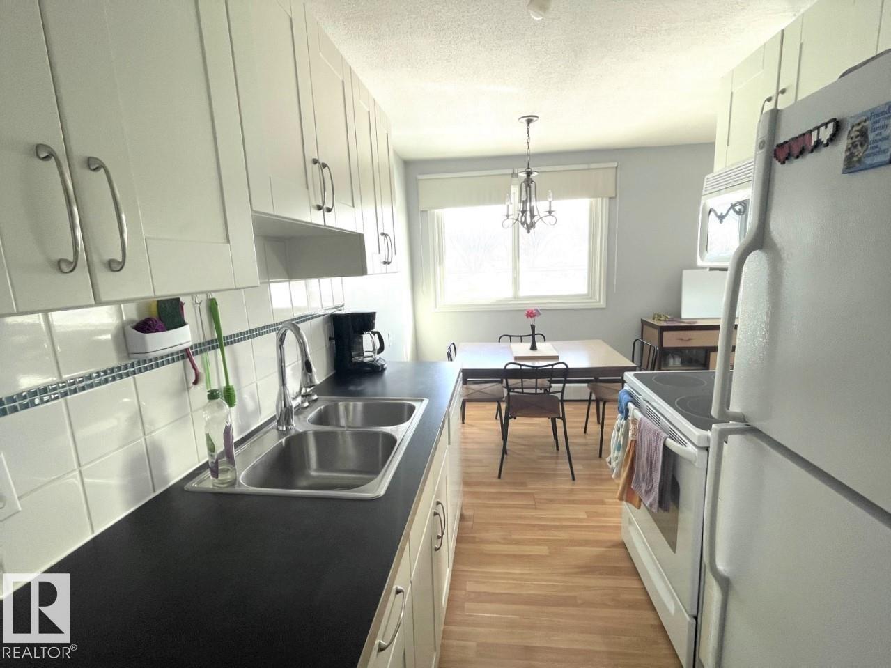 #303 12223 82 ST NW