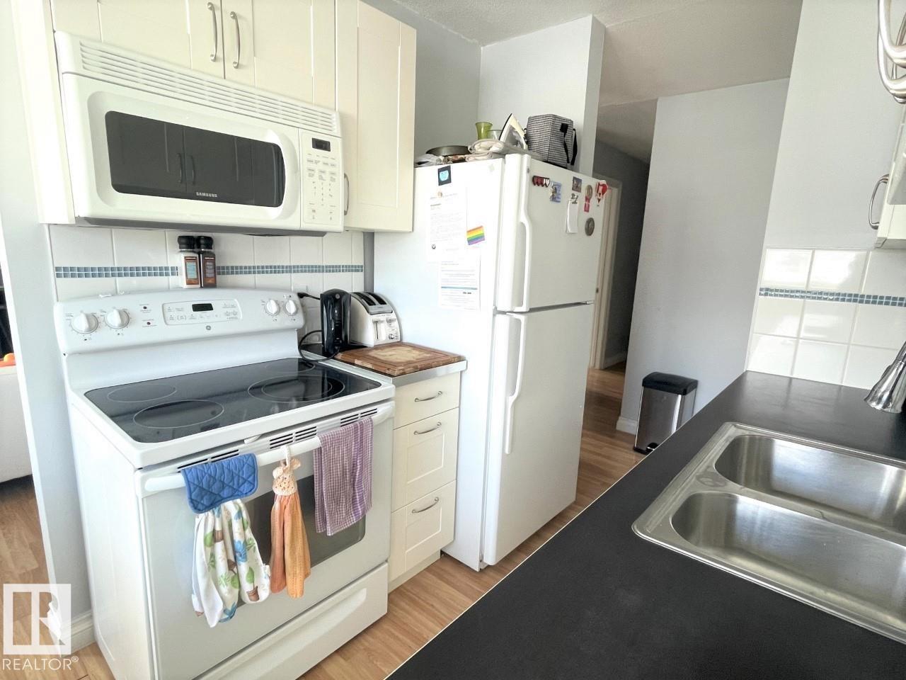 #303 12223 82 ST NW