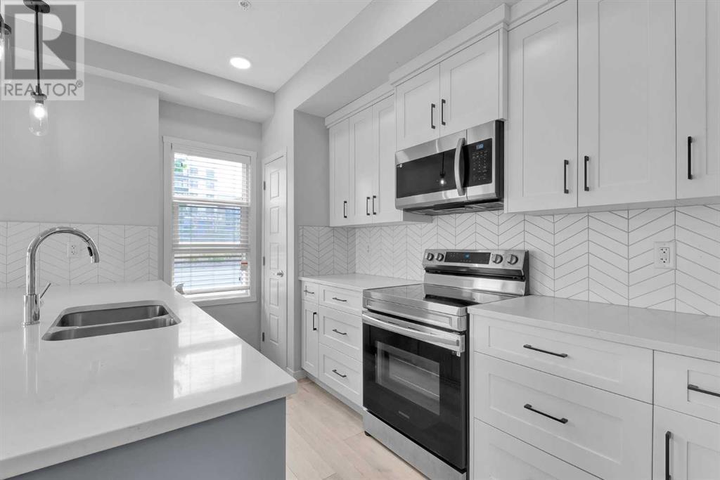 1102, 19489 Main Street SE
