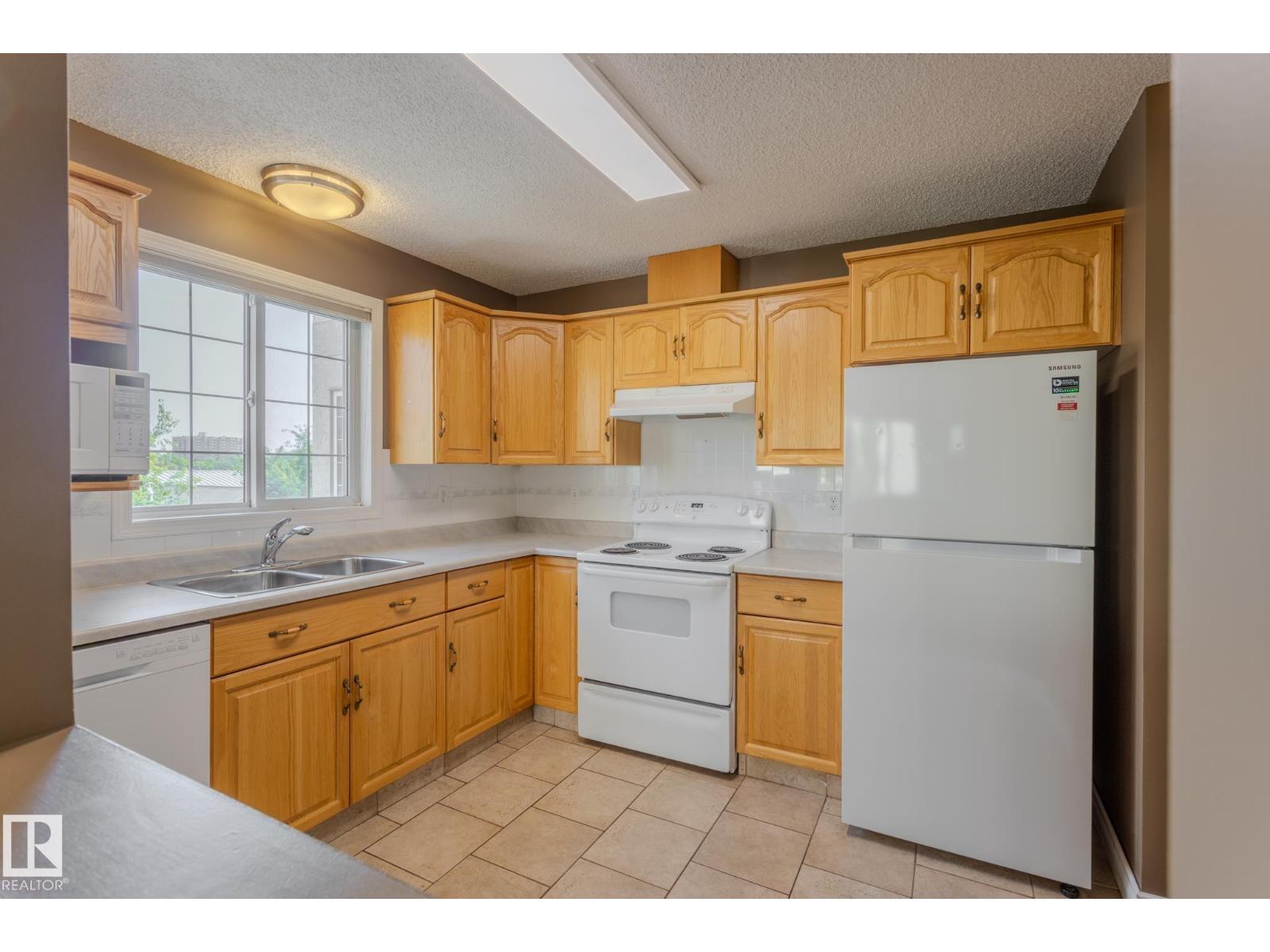 #305 13450 114 AV NW