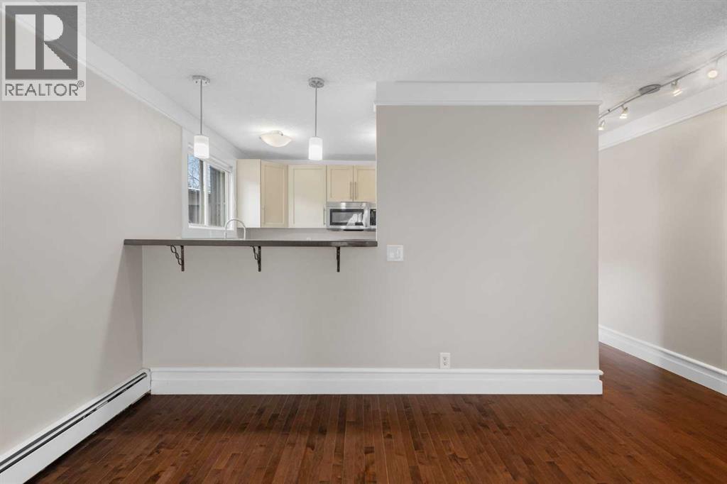 203, 644 Meredith Road NE