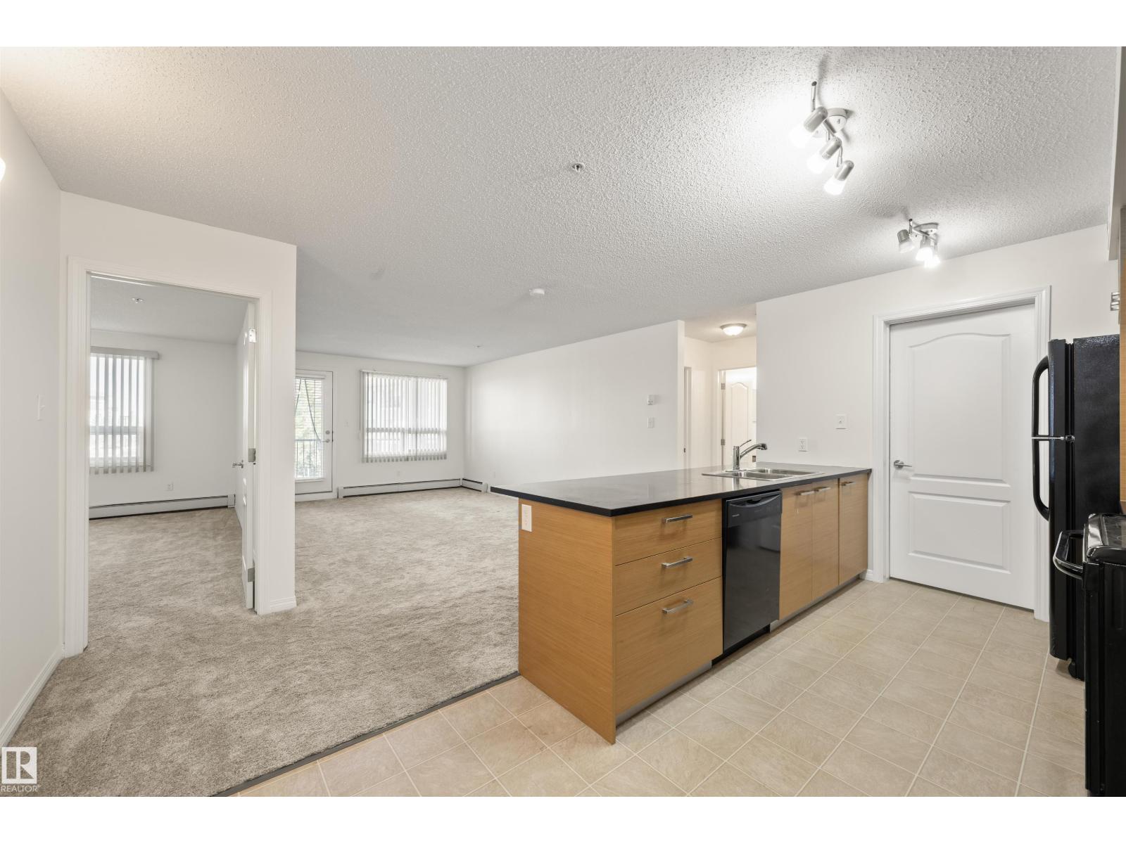 #2209 7343 SOUTH TERWILLEGAR DR NW