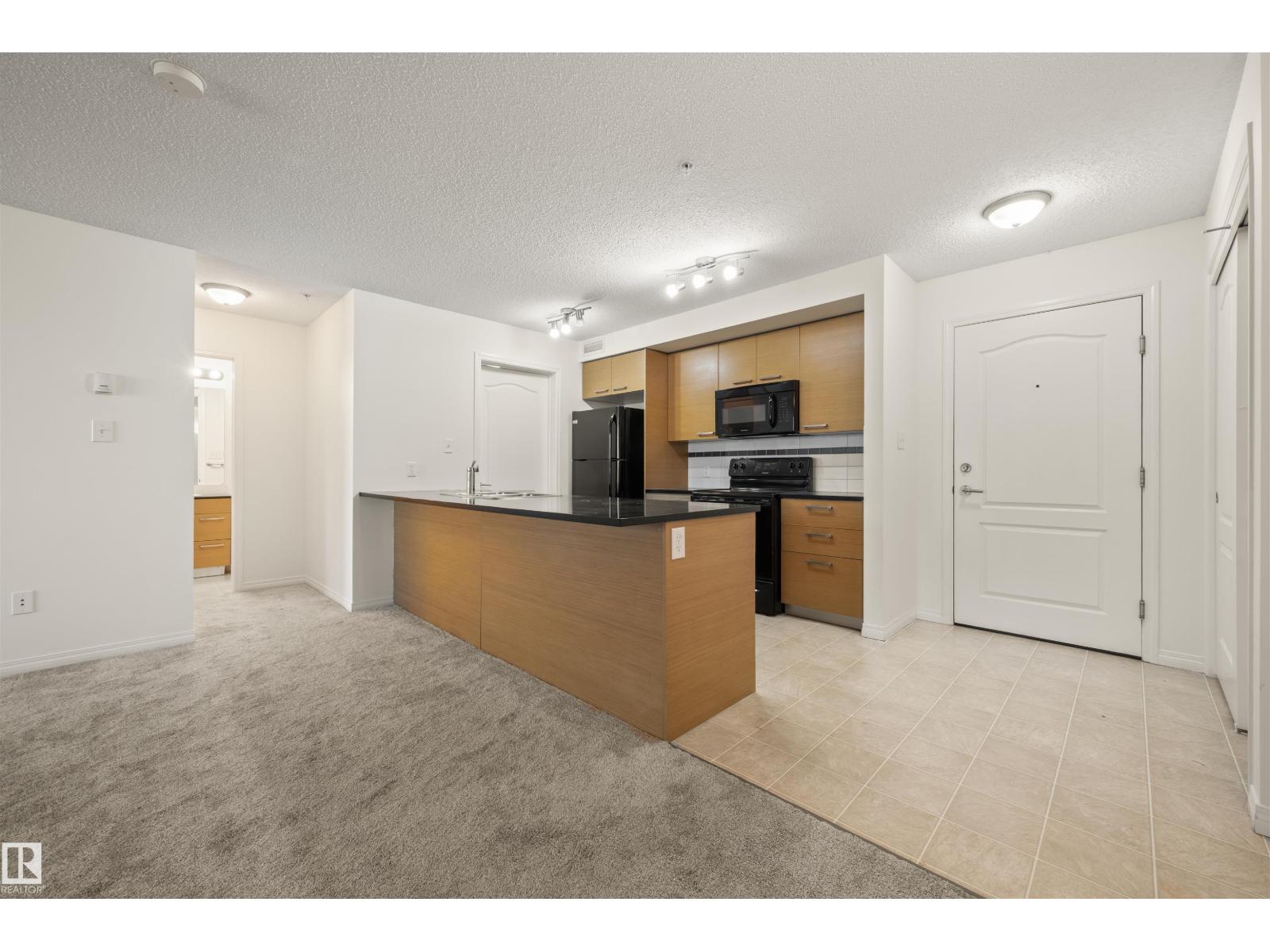 #2209 7343 SOUTH TERWILLEGAR DR NW