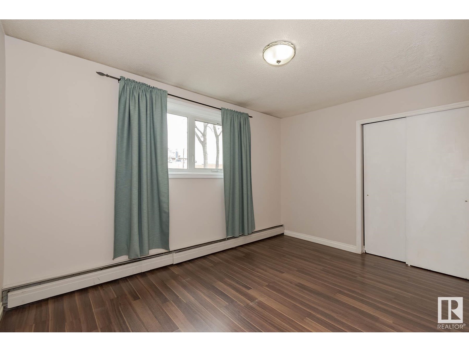 #104 10735 81 AV NW