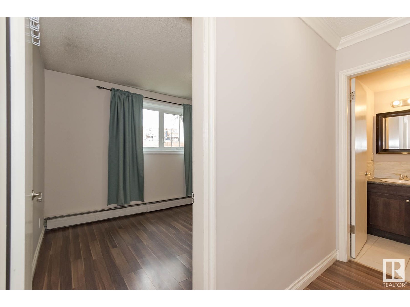 #104 10735 81 AV NW