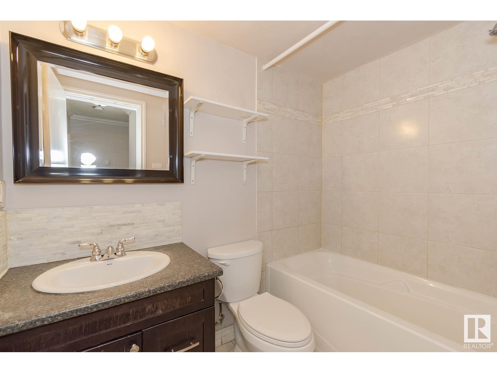 #104 10735 81 AV NW