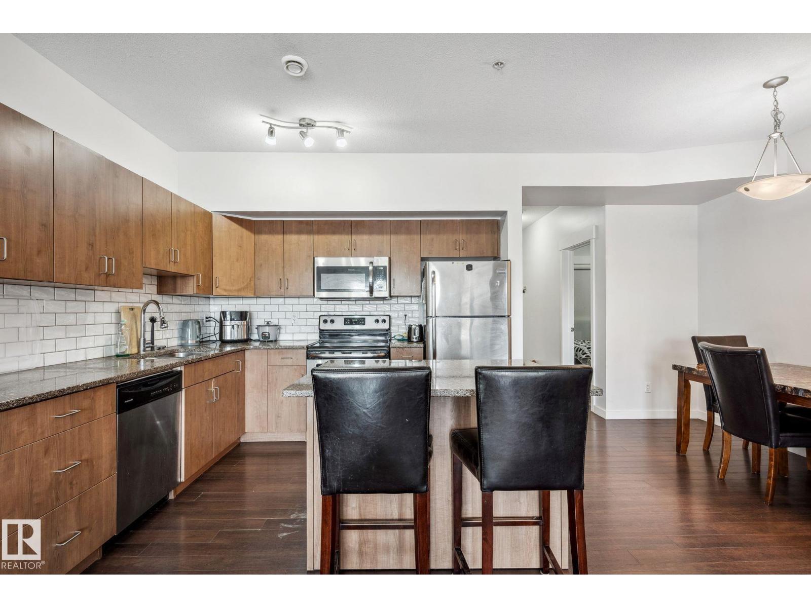 #209 10518 113 ST NW