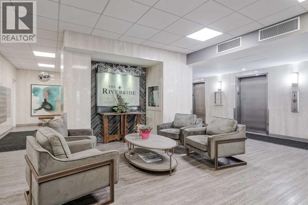 305, 145 Point Drive NW