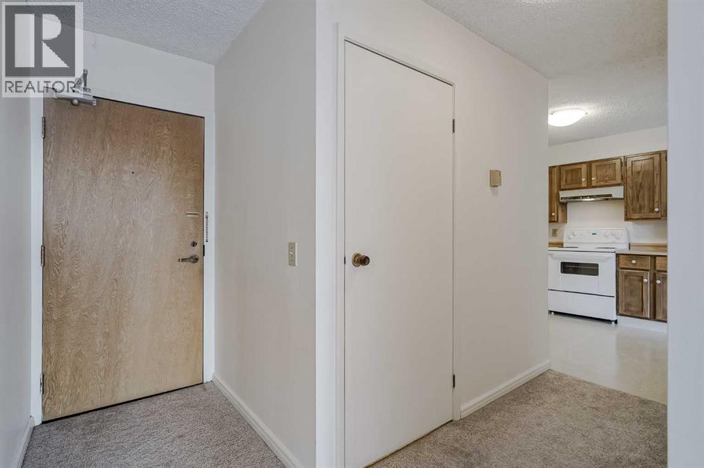 305, 145 Point Drive NW