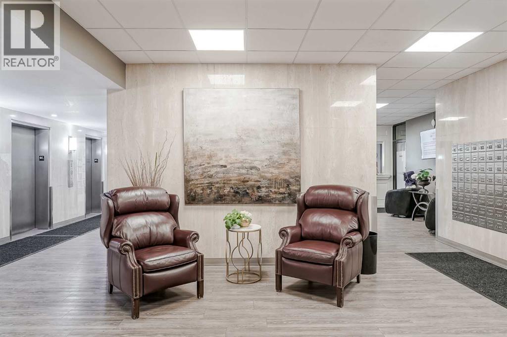 305, 145 Point Drive NW