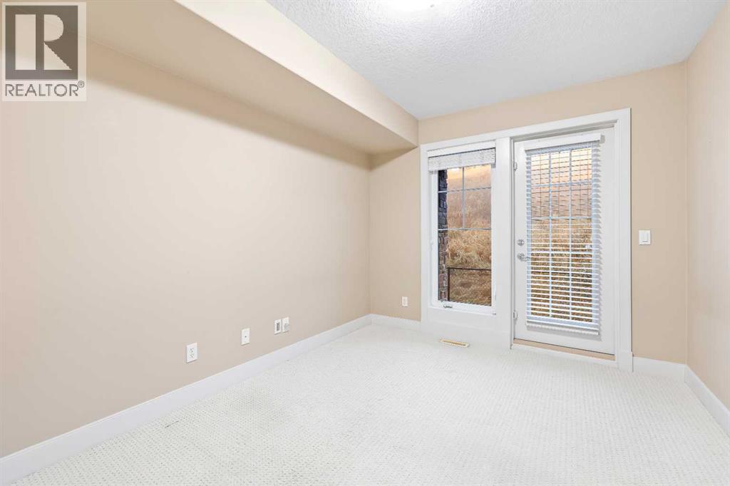 402, 10 Discovery Ridge Hill SW