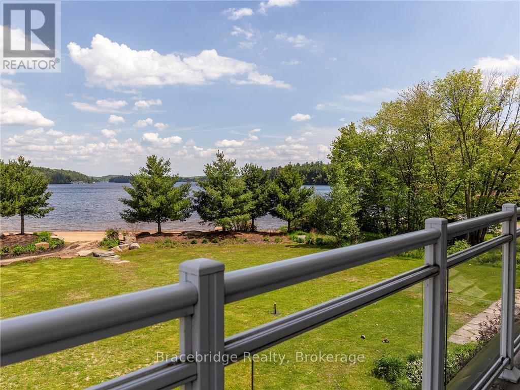 Photo 1 of 18 — G103-D2 - 1869 MUSKOKA ROAD 118 HIGHWAY W Unit G103-D2, Muskoka Lakes (Monck (Muskoka Lakes)), ON P1L1W8
