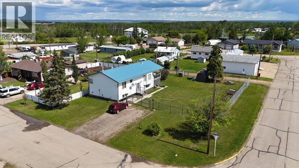 Photo 1 of 27 — 908 4 Avenue, Hines Creek, AB T0H2A0