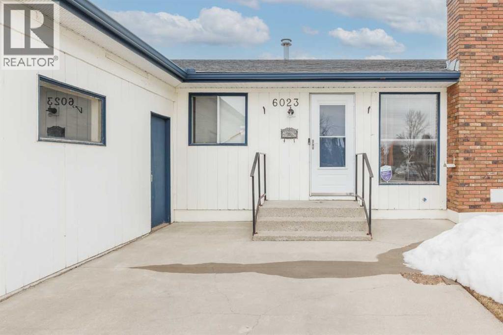 6023 MADDOCK Drive NE