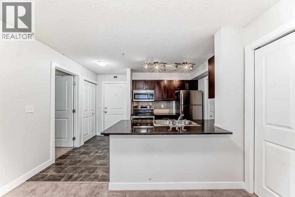 9309, 403 Mackenzie Way SW