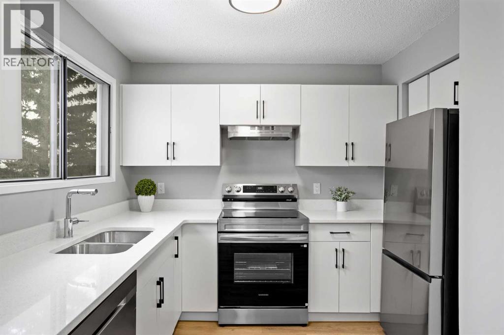 8, 6915 Ranchview Drive NW