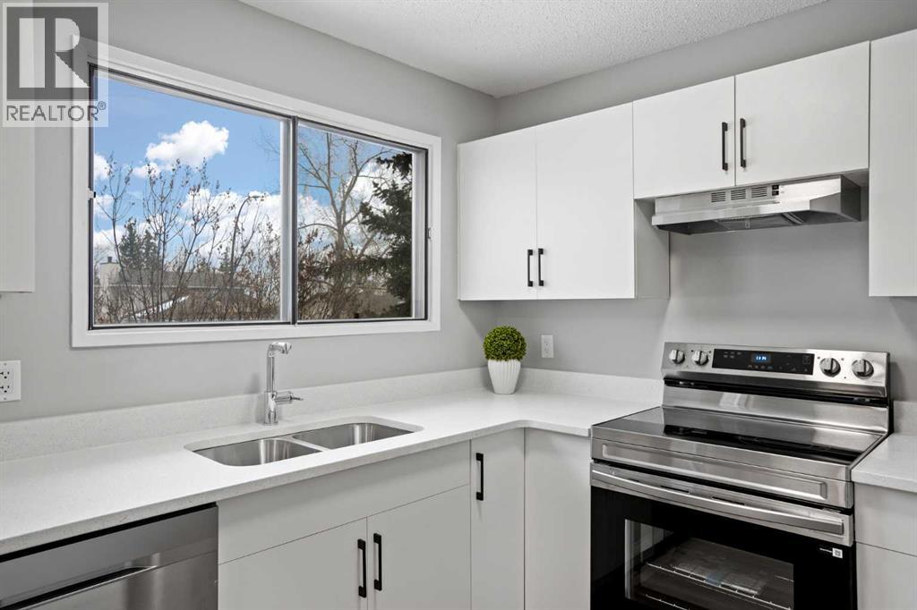 8, 6915 Ranchview Drive NW