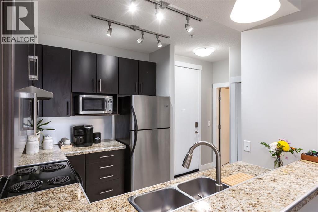 309, 880 Centre Avenue NE