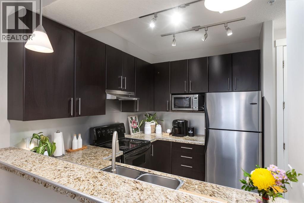 309, 880 Centre Avenue NE