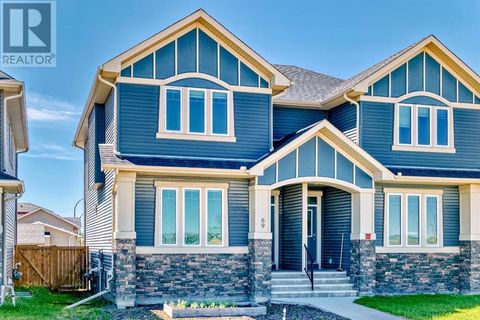 69 River Heights Drive Cochrane AB T4C0Y1