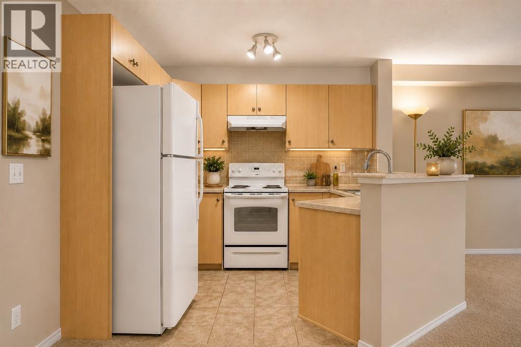 7103, 304 Mackenzie Way SW
