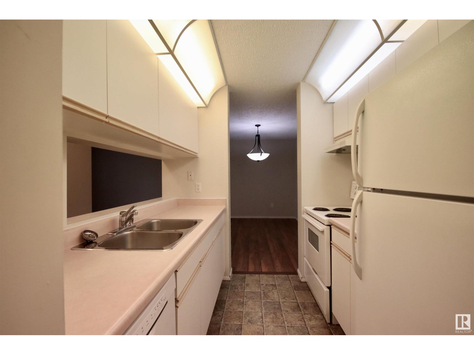 #305 11218 80 ST NW