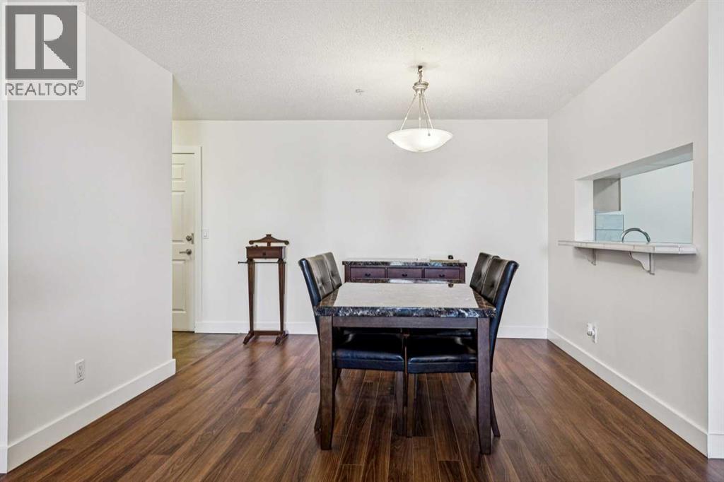 202, 2022 Canyon Meadows Drive SE