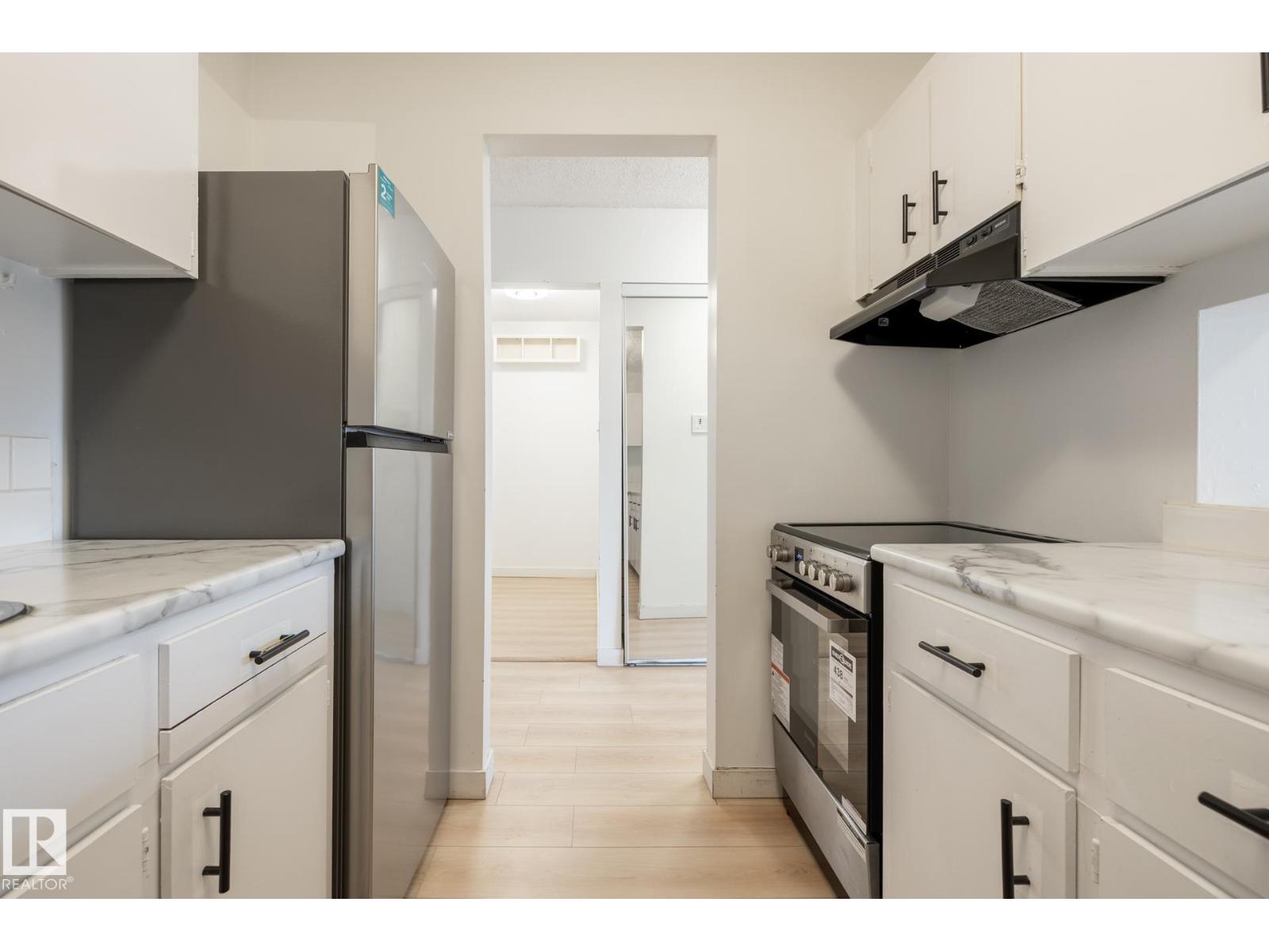 #303 10620 104 ST NW