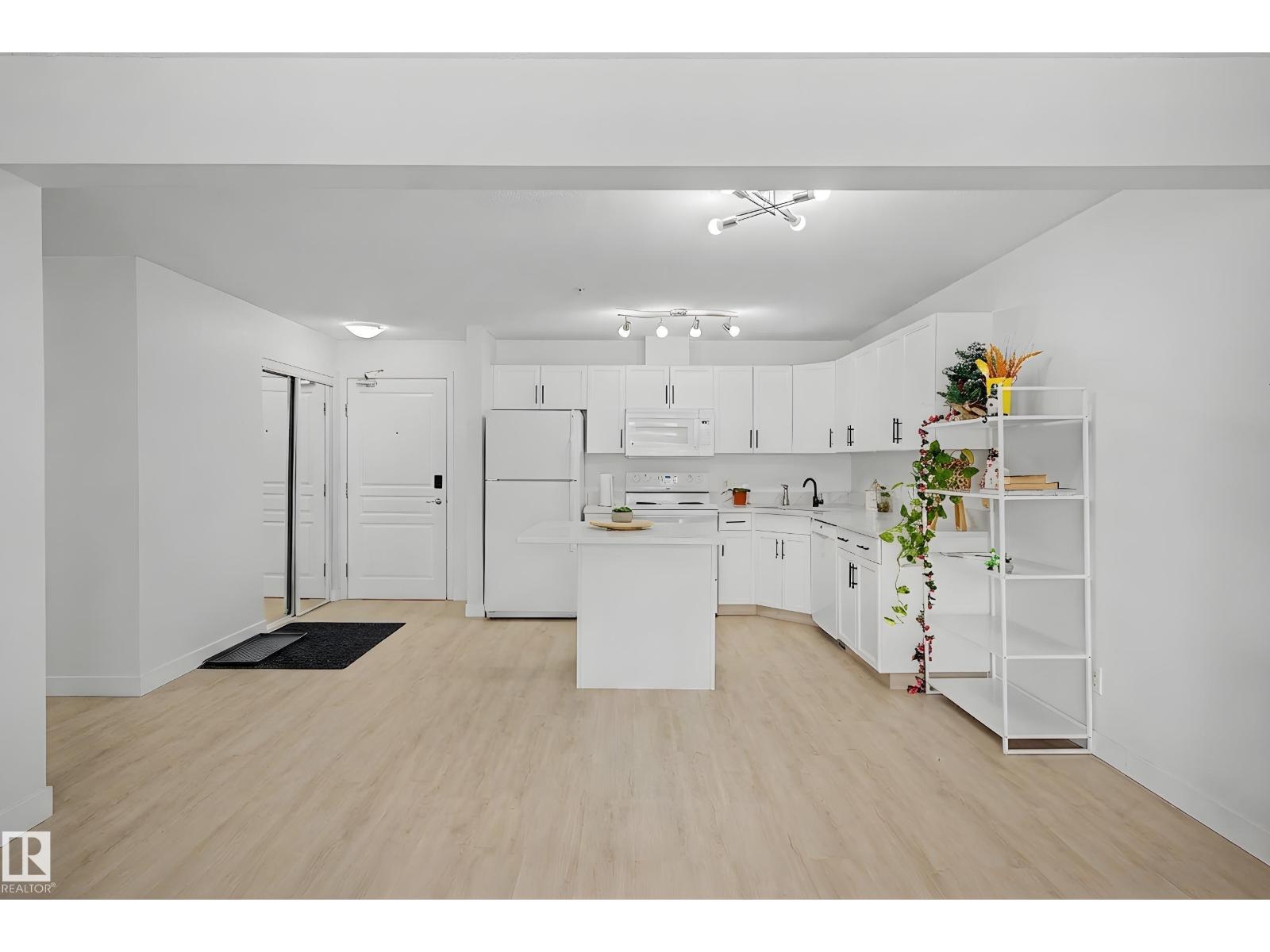 #320 309 CLAREVIEW STATION DR NW