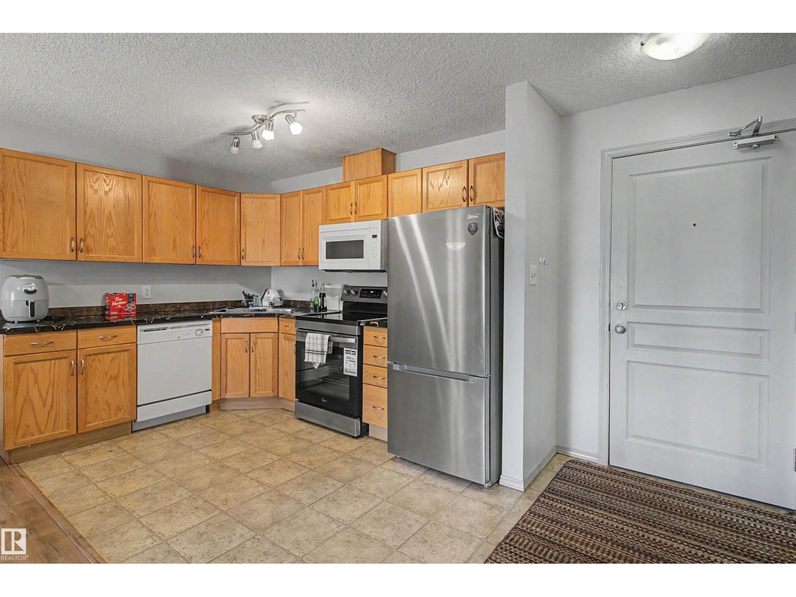#204 309 CLAREVIEW STATION DR NW