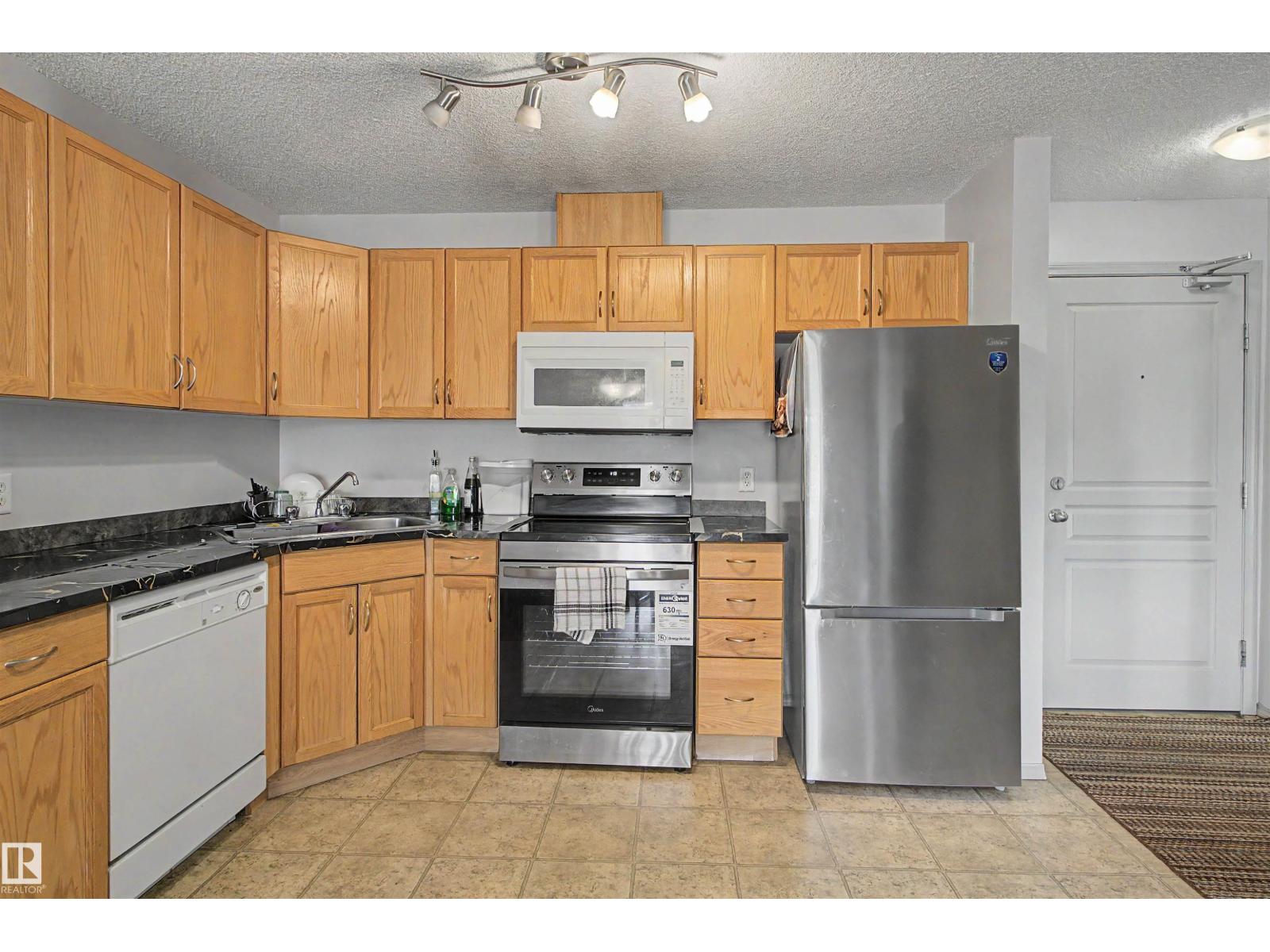 #204 309 CLAREVIEW STATION DR NW