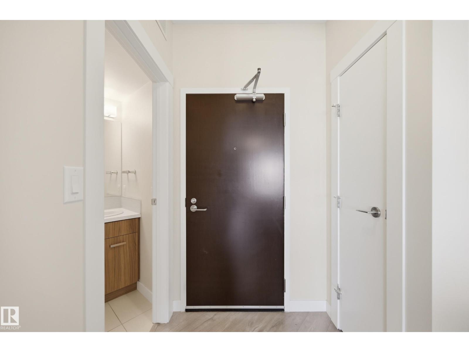 #1206 10410 102 AV NW