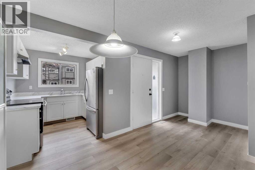 104, 7172 Coach Hill Road SW