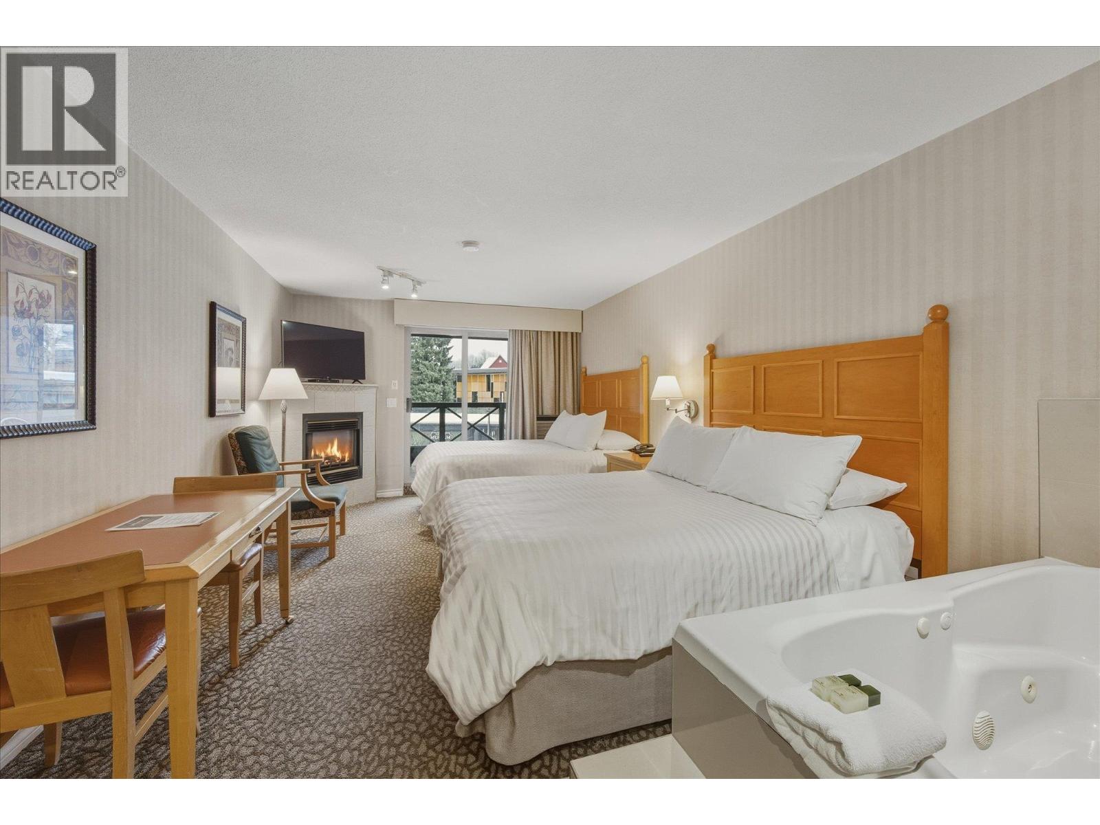 203 4319 MAIN STREET