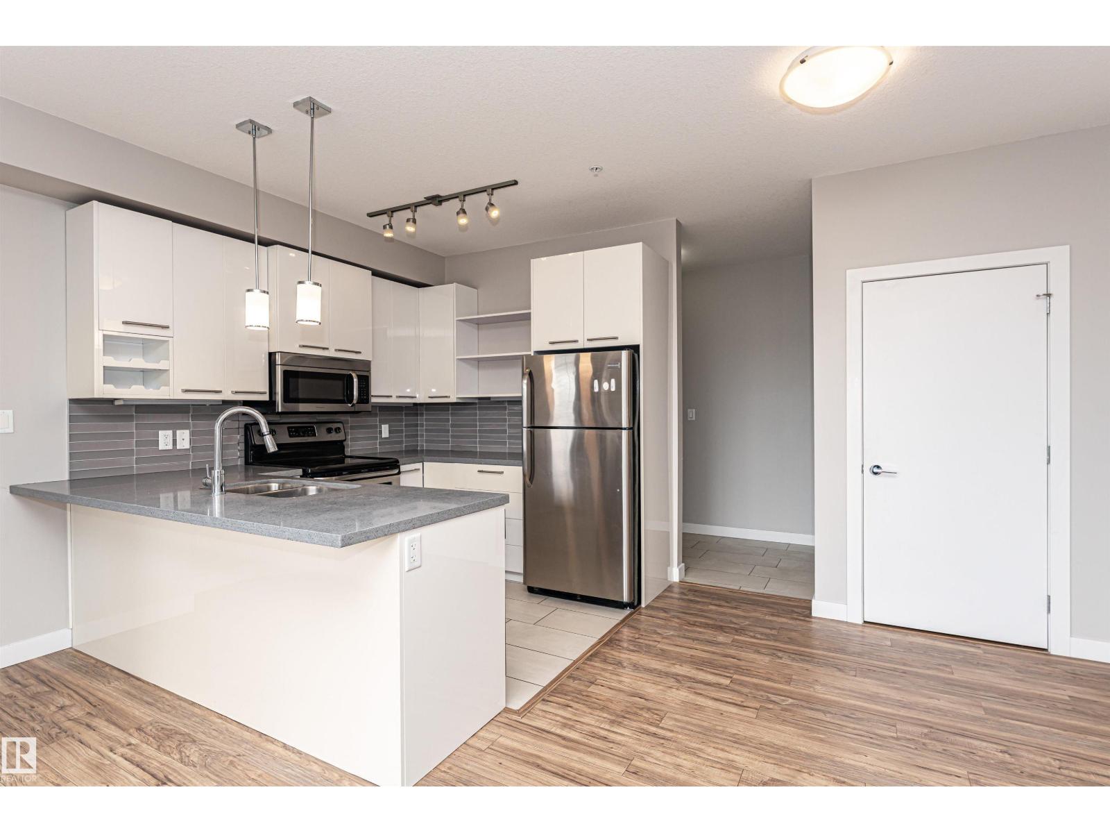 #313 10418 81 AV NW