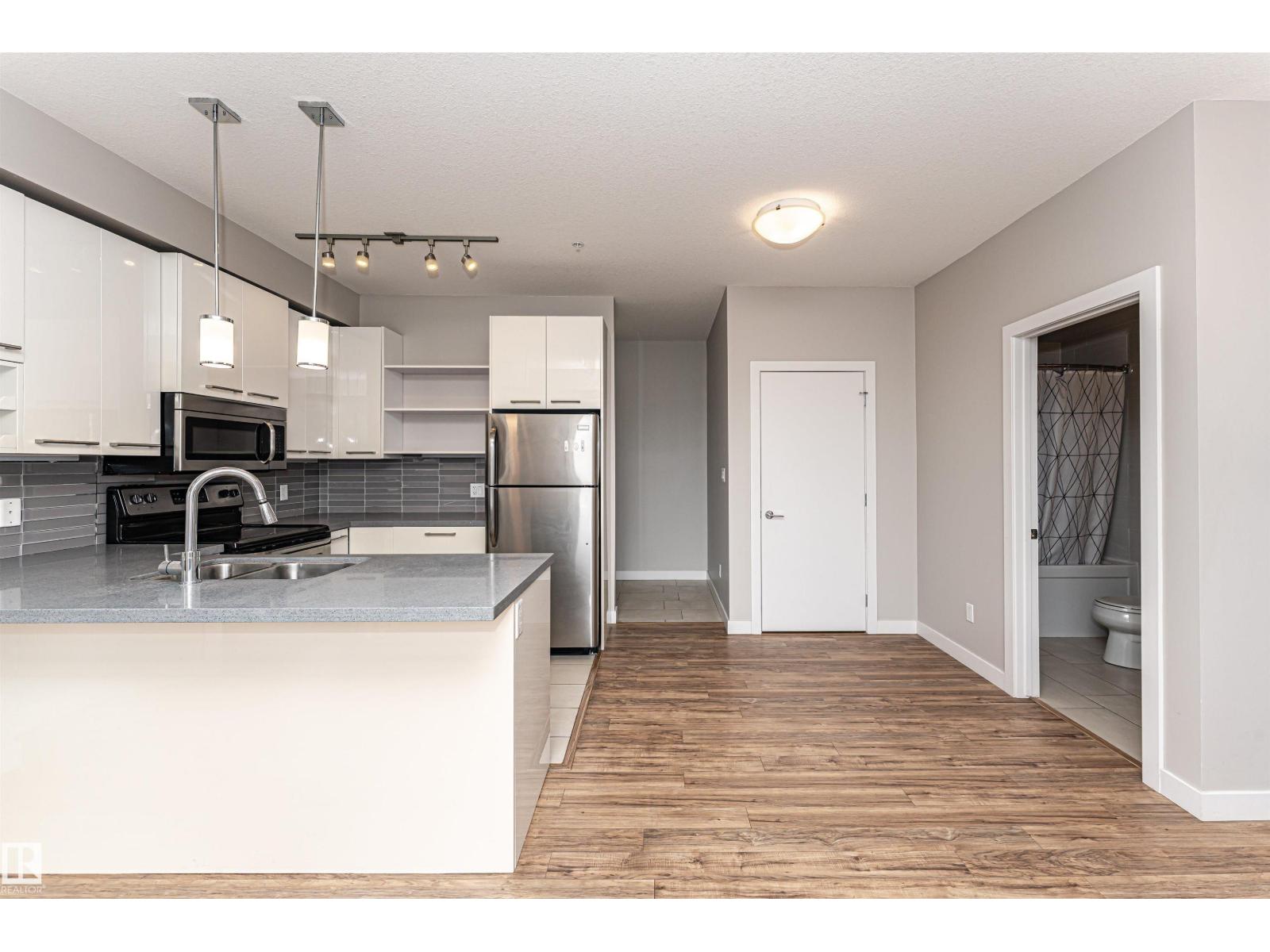 #313 10418 81 AV NW