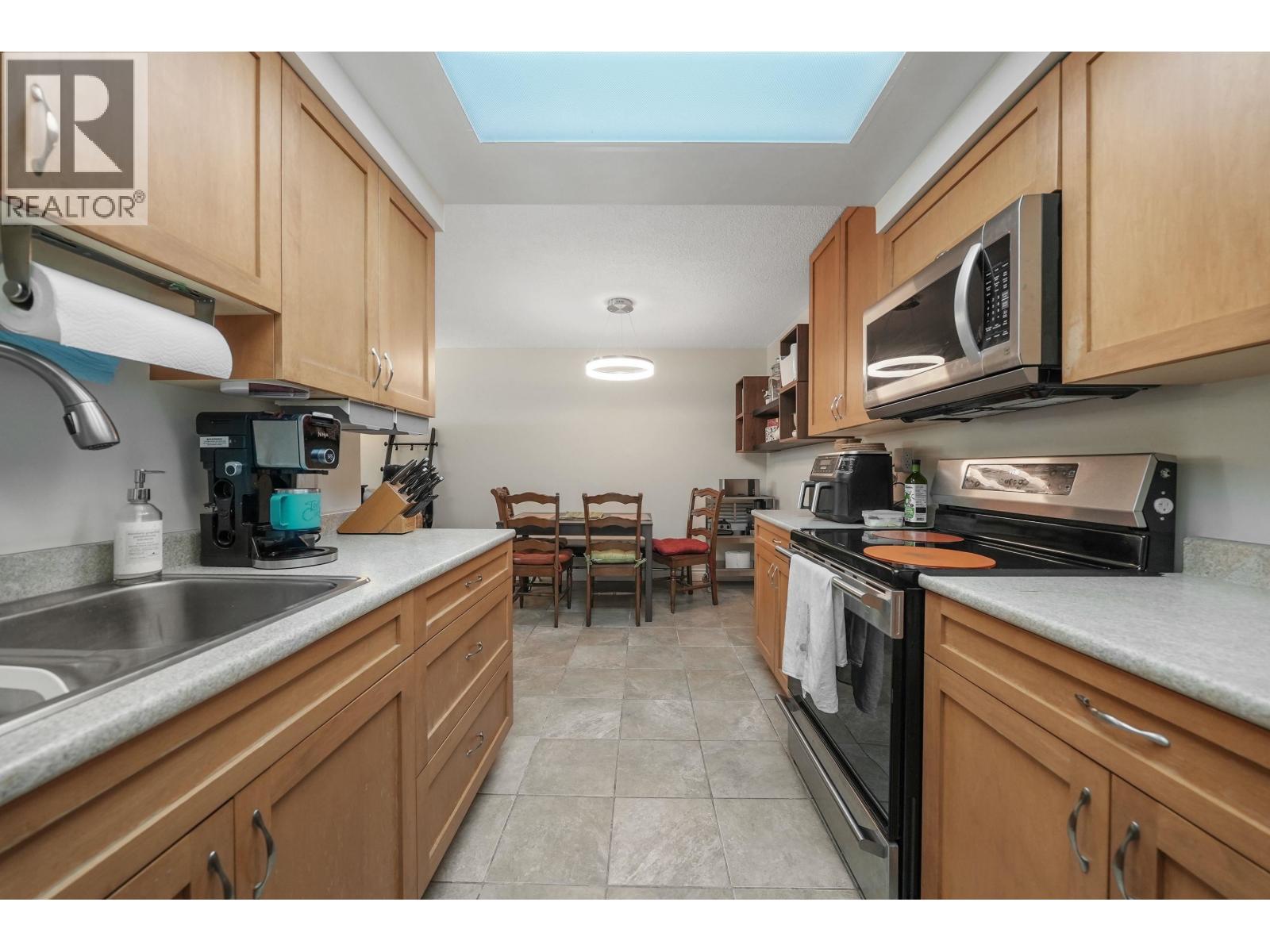 201 444 E 6TH AVENUE