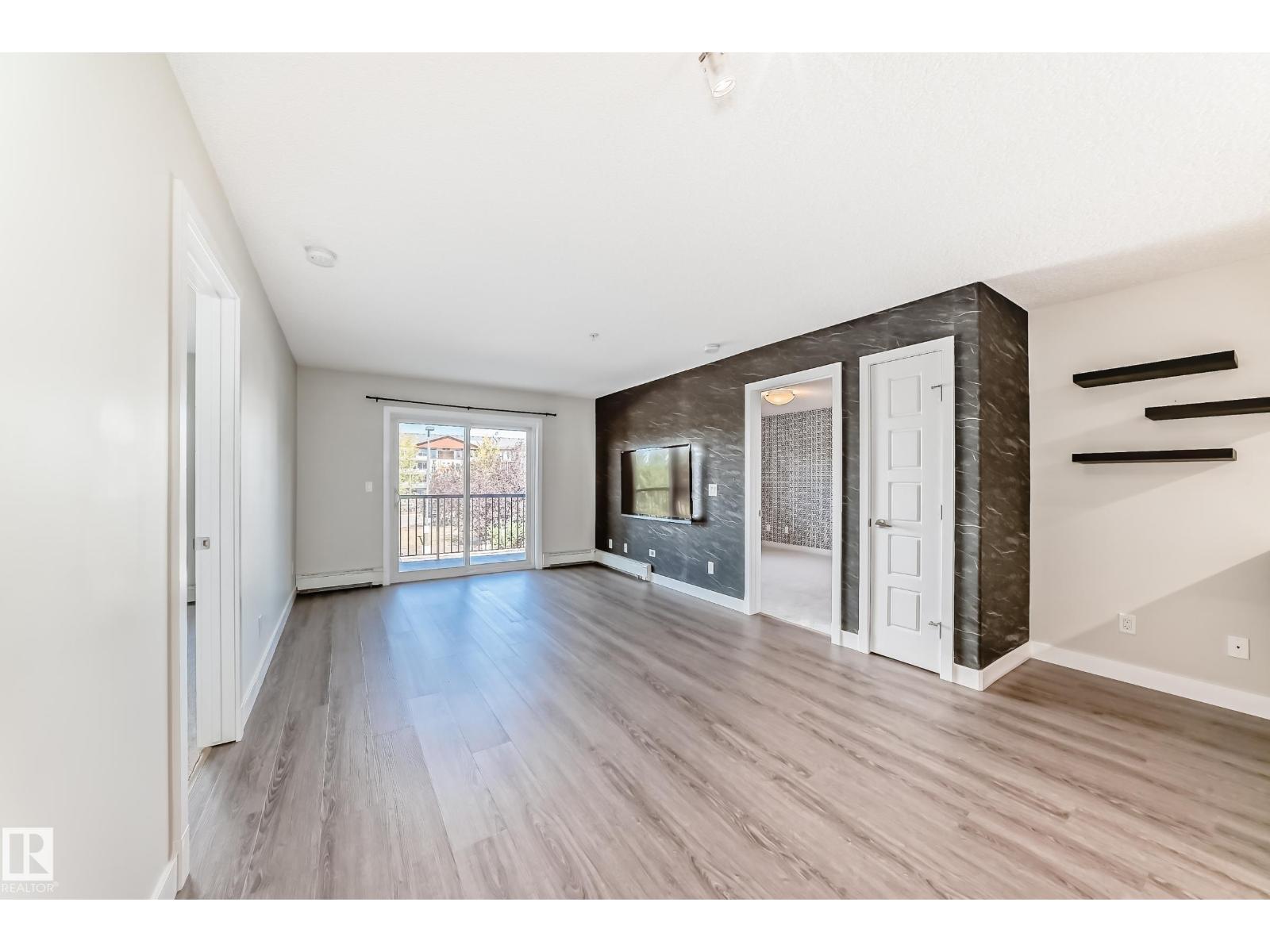 #220 14808 125 ST NW