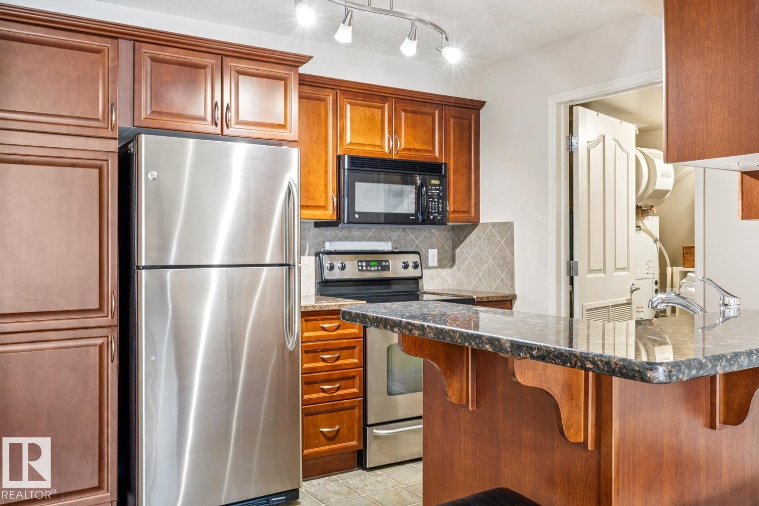 #113 7510 89 ST NW