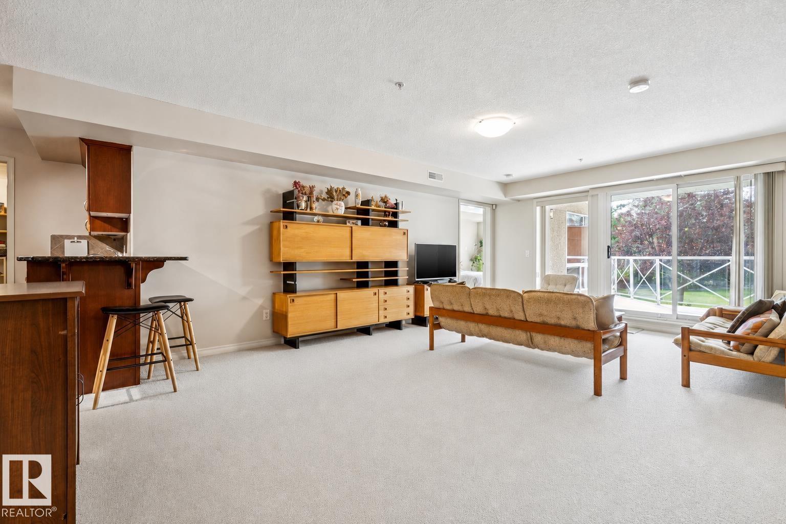 #113 7510 89 ST NW