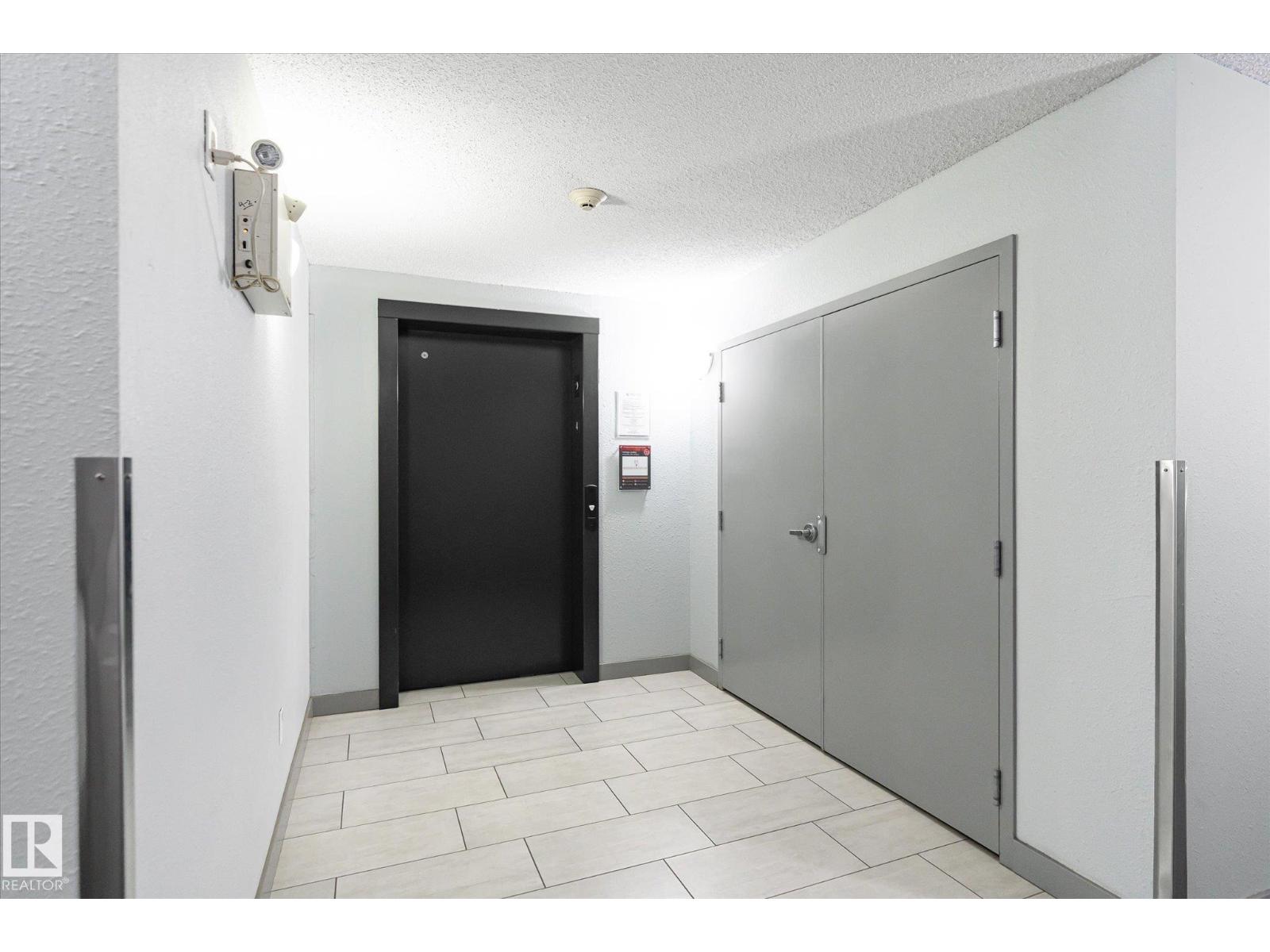 #409 11816 22 AV SW