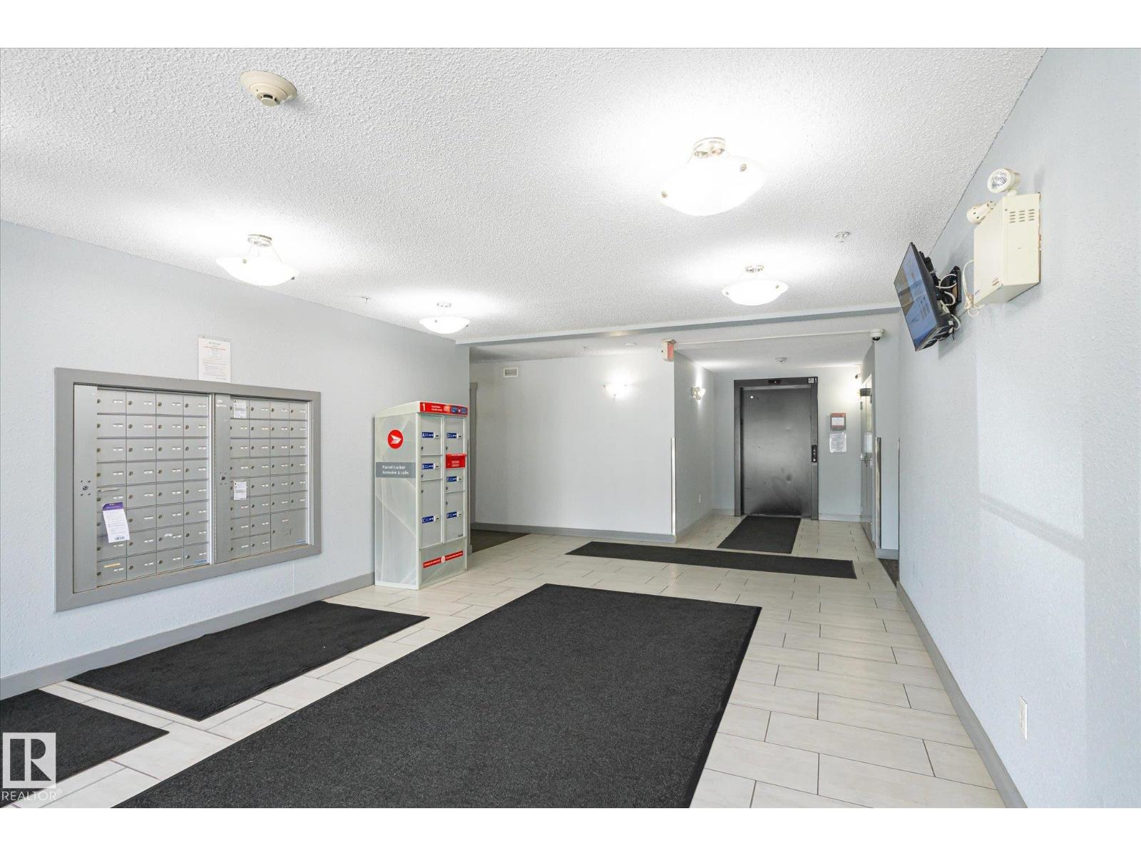 #409 11816 22 AV SW