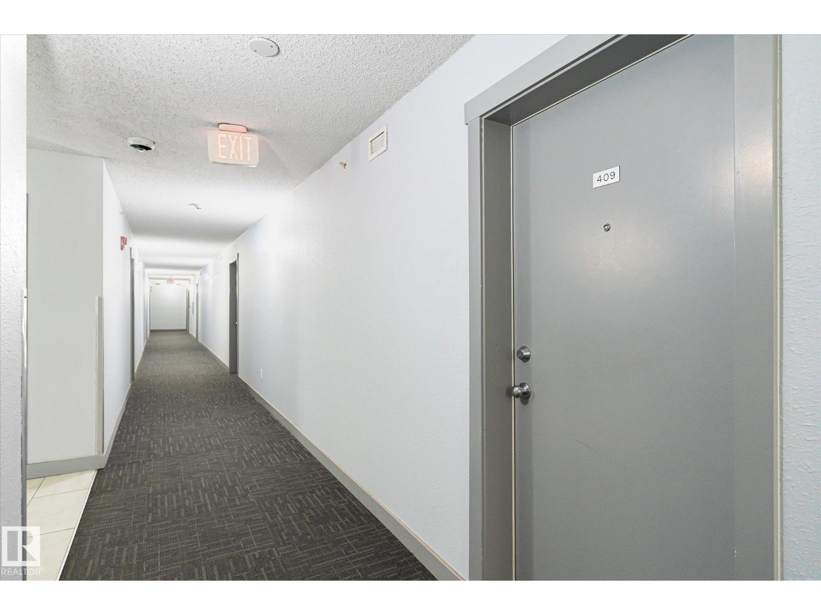 #409 11816 22 AV SW