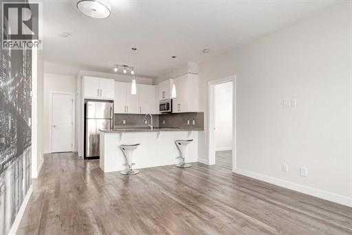 313, 12 Sage Hill Terrace NW