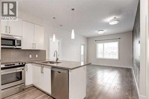 313, 12 Sage Hill Terrace NW