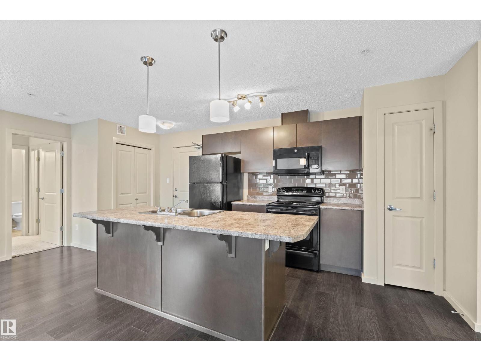 #307 340 WINDERMERE RD NW