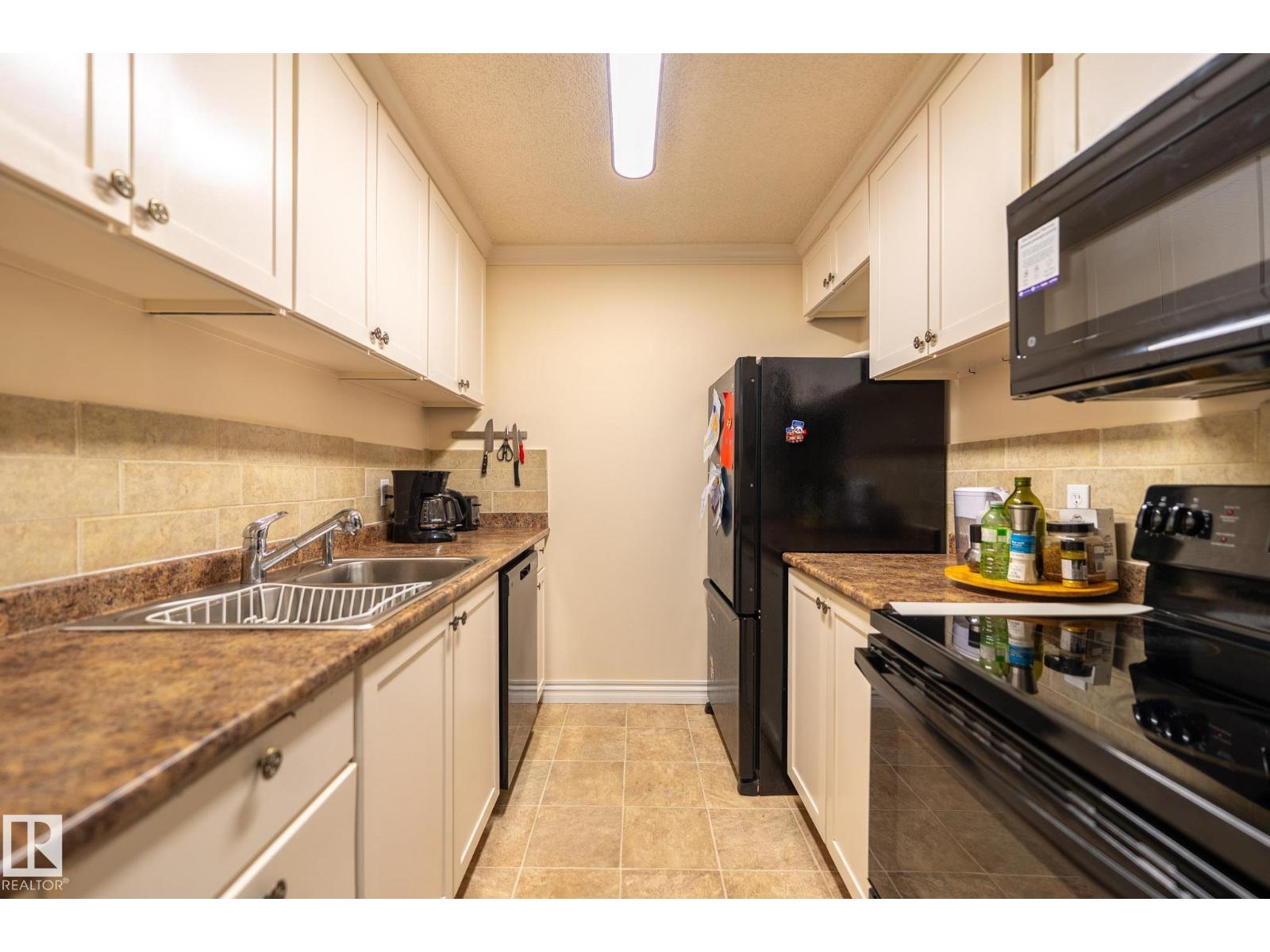 #142 10636 120 ST NW