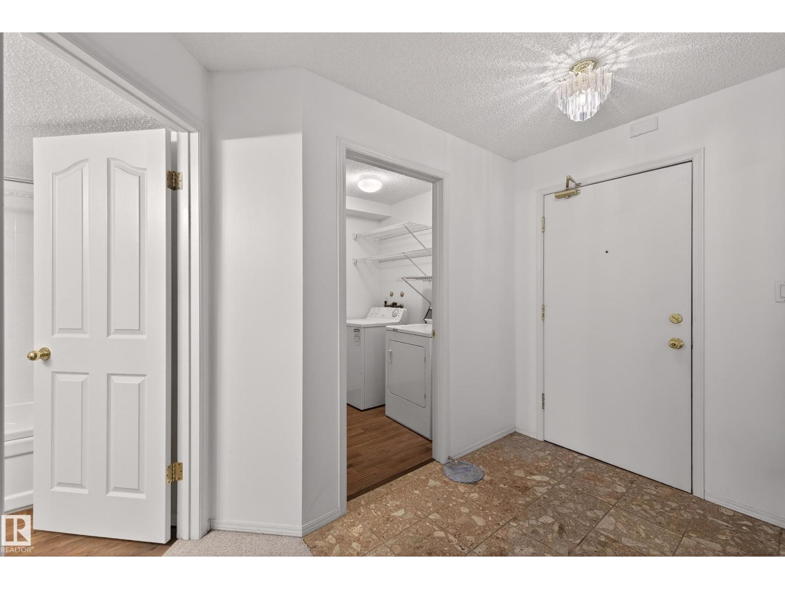 #106 15499 CASTLE DOWNS RD NW